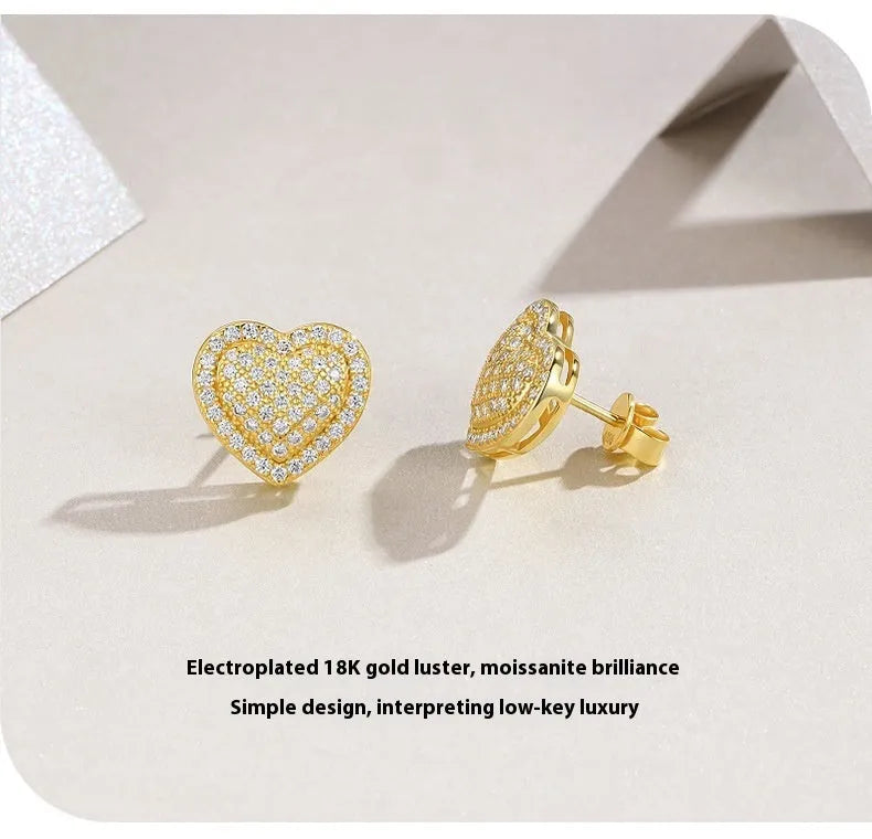 Golden heart-shaped stud earrings with moissanite stones on S925 silver
