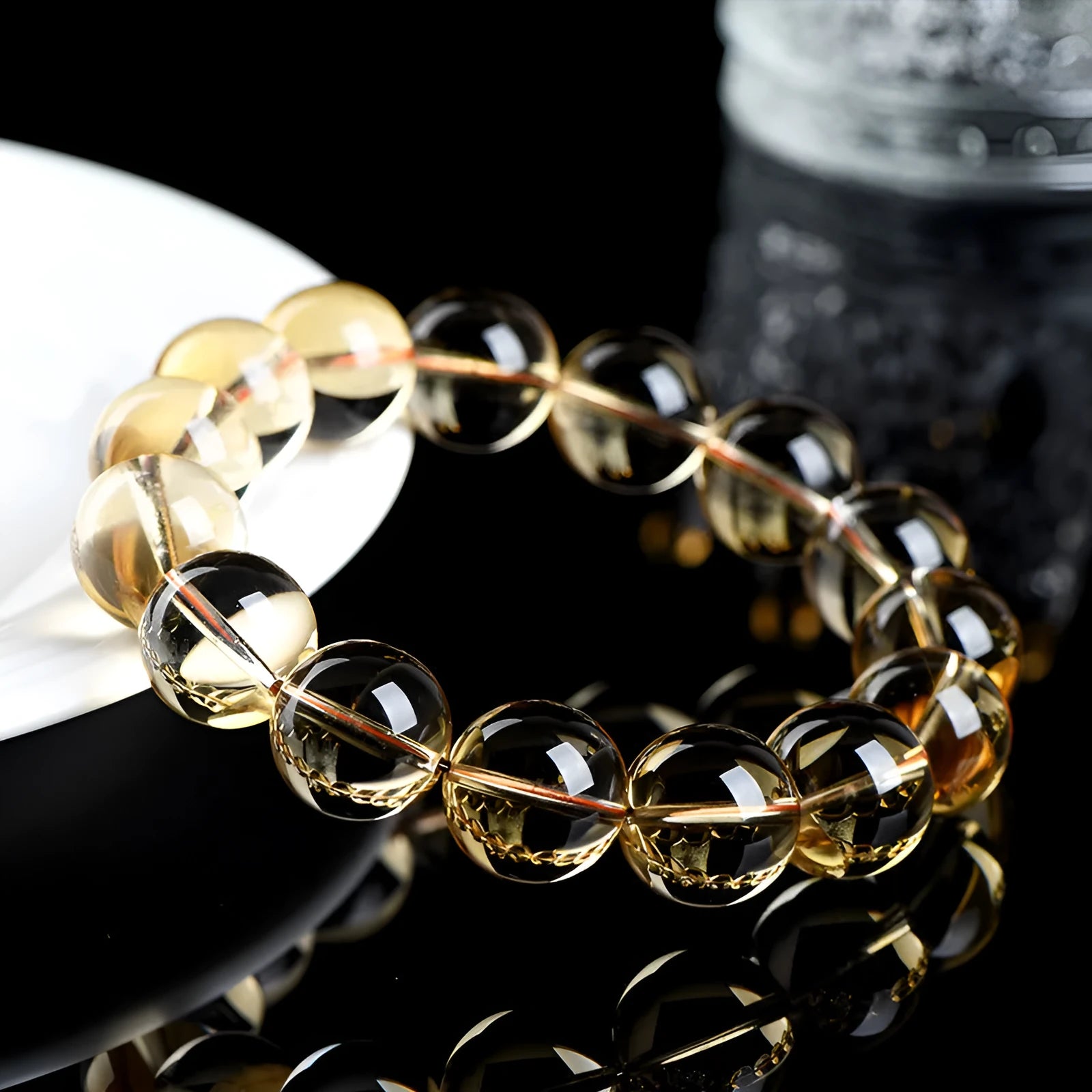 Natural citrine scattered beads ball bracelet in 7A and 6A colour grades on a wrist.
