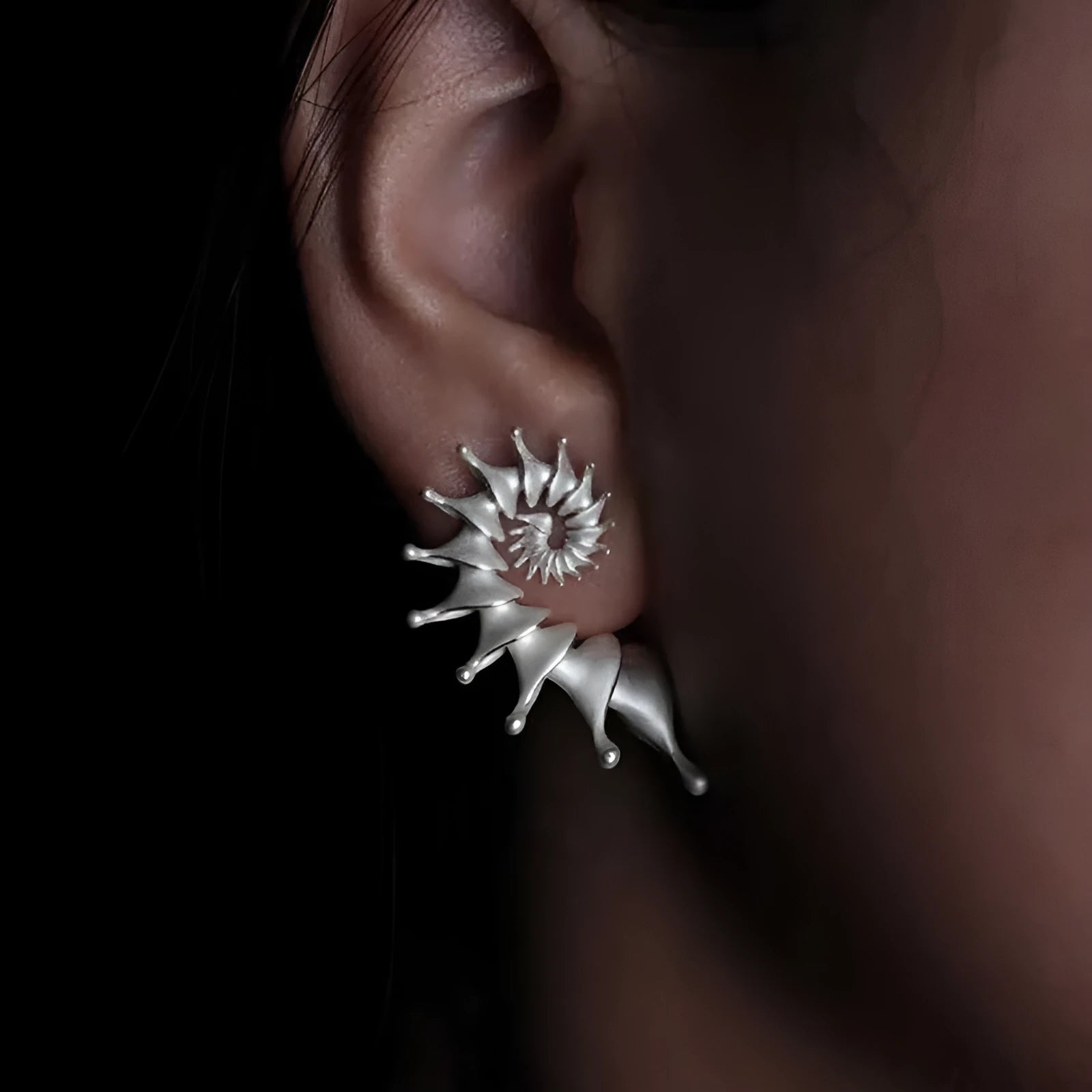 Three-dimensional matte conch shell stud earrings with electroplated alloy construction and irregular shape