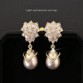 Drop-shaped women's pearl earrings with zircon stones in copper 18K setting