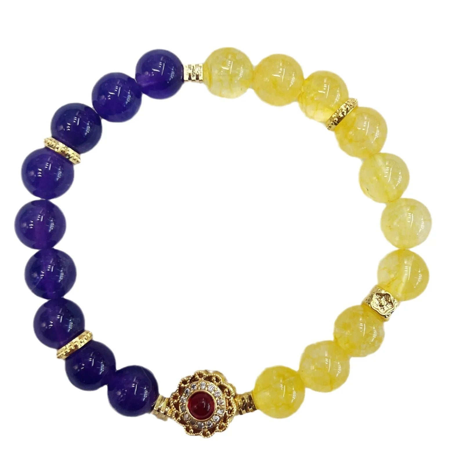 Handmade women's bracelet with yellow and purple amethyst crystals on wrist