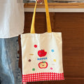 Cartoon canvas handbag with kitten print design measuring 30x36x24cm