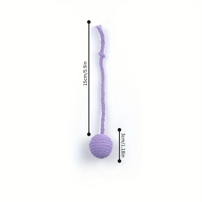 Colourful cat toy ball with attached rope and internal bell, shown in green, pink, purple, and yellow variants.