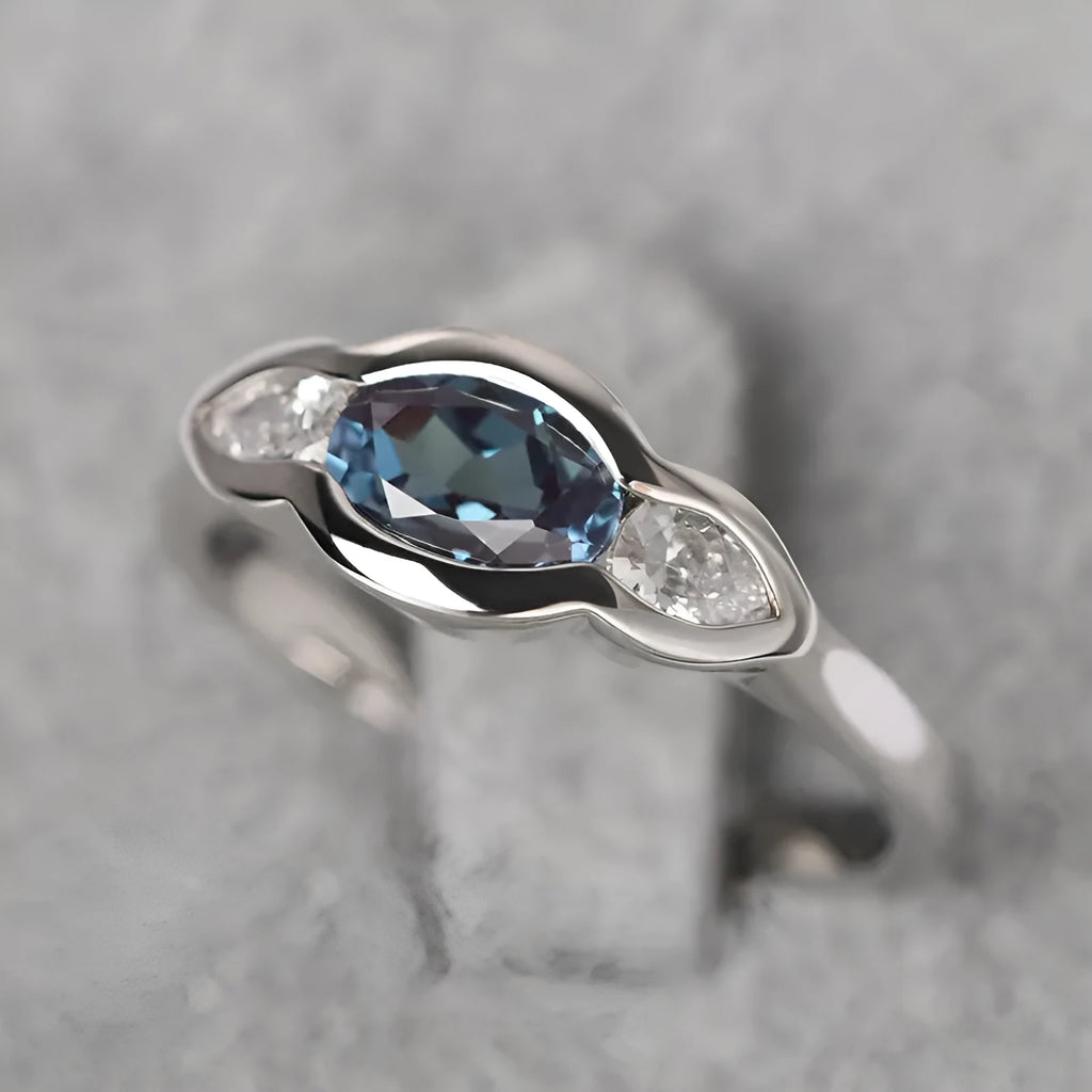 Geometric ellipse zircon ring in white gold colour on copper base