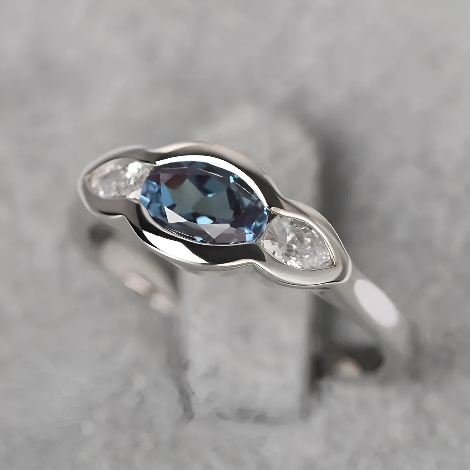 Geometric ellipse zircon ring in white gold colour on copper base
