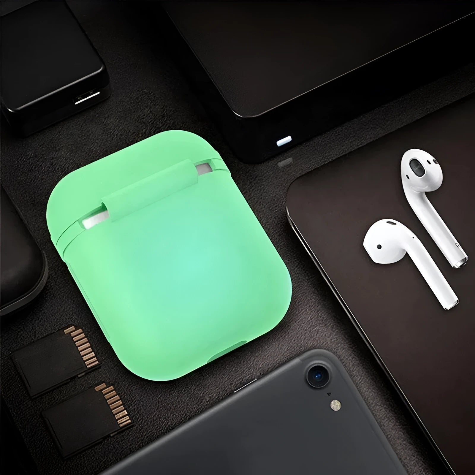 Luminous solid colour silicone flip-top protective case for Apple AirPods.