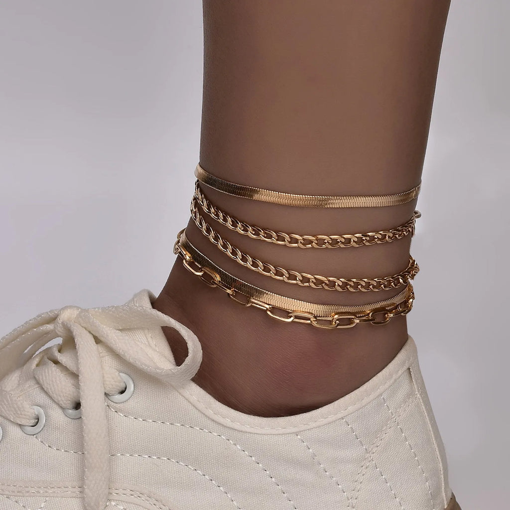 Women's multi-layer metal chain anklet set in gold and silver colour options on display