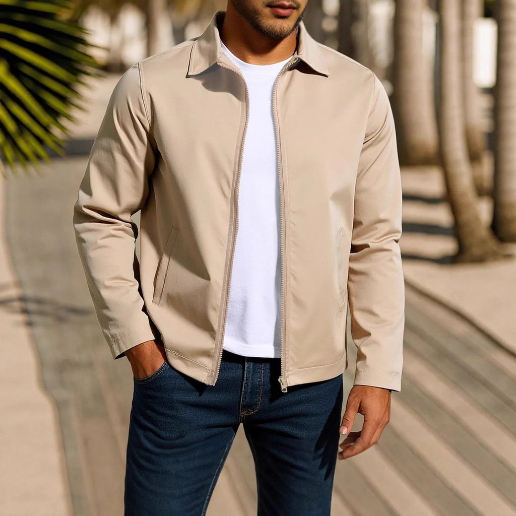 Man wearing a green zip-up cardigan jacket with raglan sleeves on a casual day out.