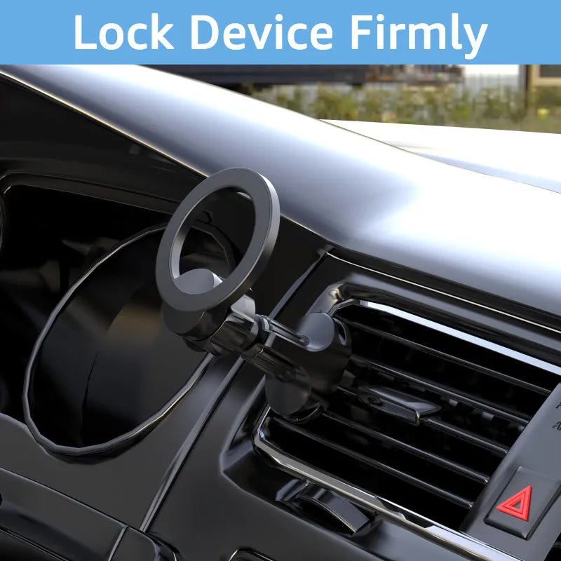 Black magnetic car phone holder mounted on vehicle air vent