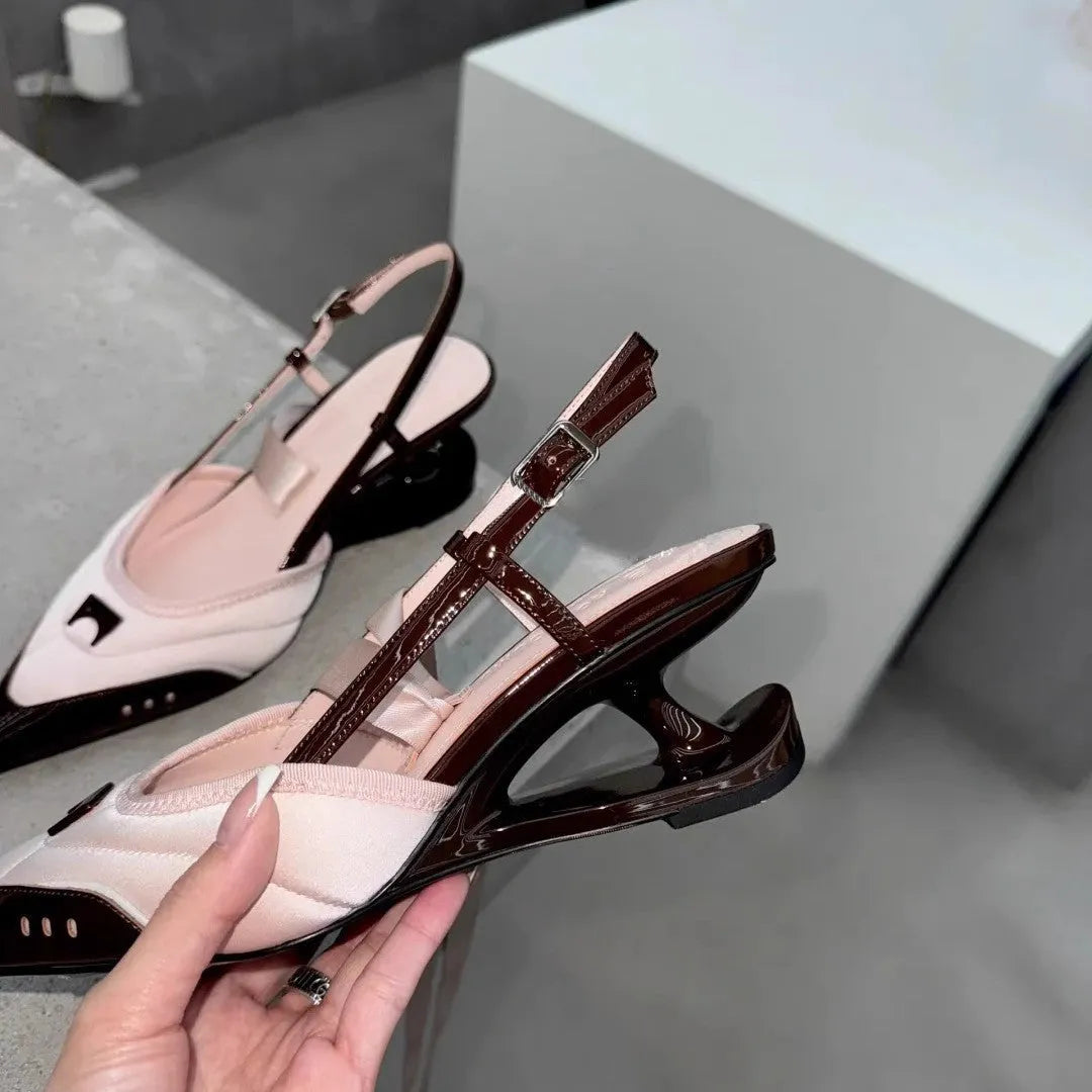 Women's special-shaped root lace-up high heels in black and pink, showing cowhide upper and lace detail.