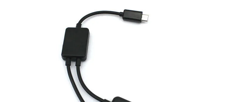 Black Micro USB OTG one-to-four adapter with charging switch, 0.25m cable, for Android phones and tablets.