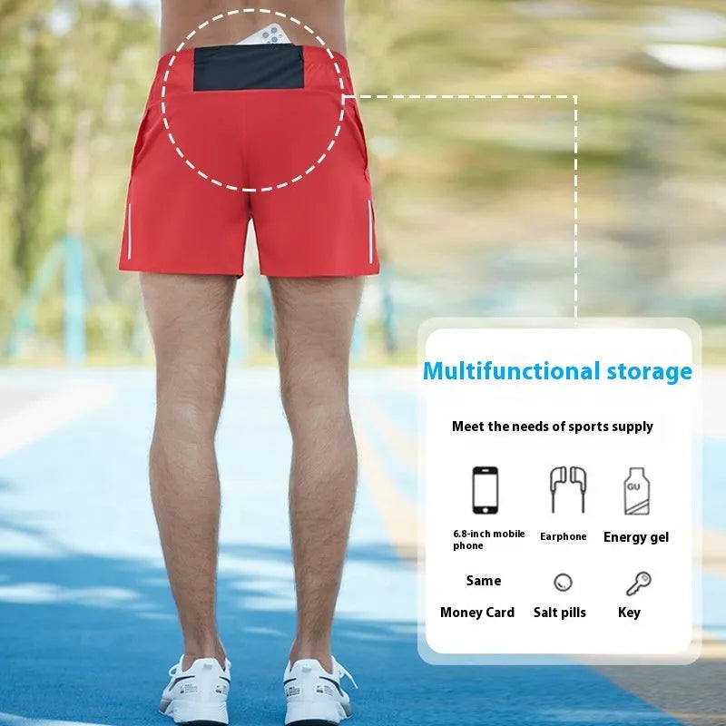 Men's black high-waist off-road running shorts with a loose, breathable fit.