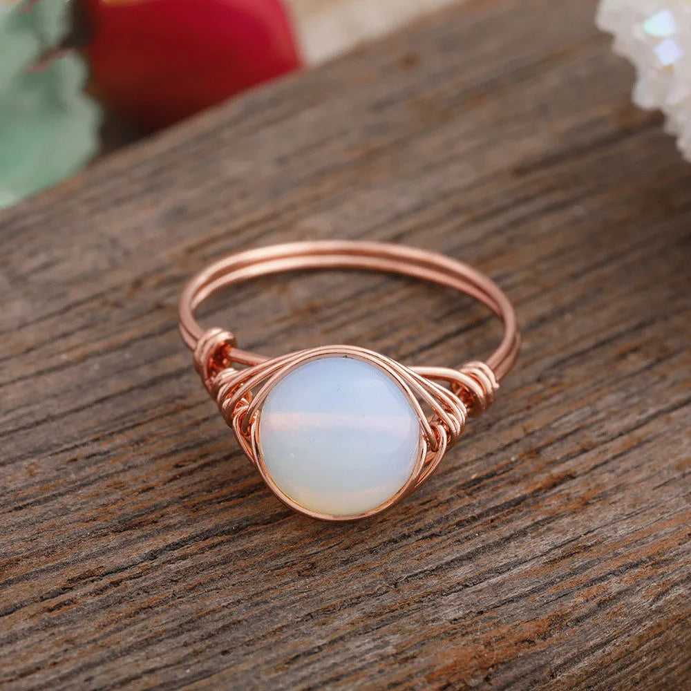 Handmade natural stone ring with adjustable copper band on finger, Amethyst Quartz option.
