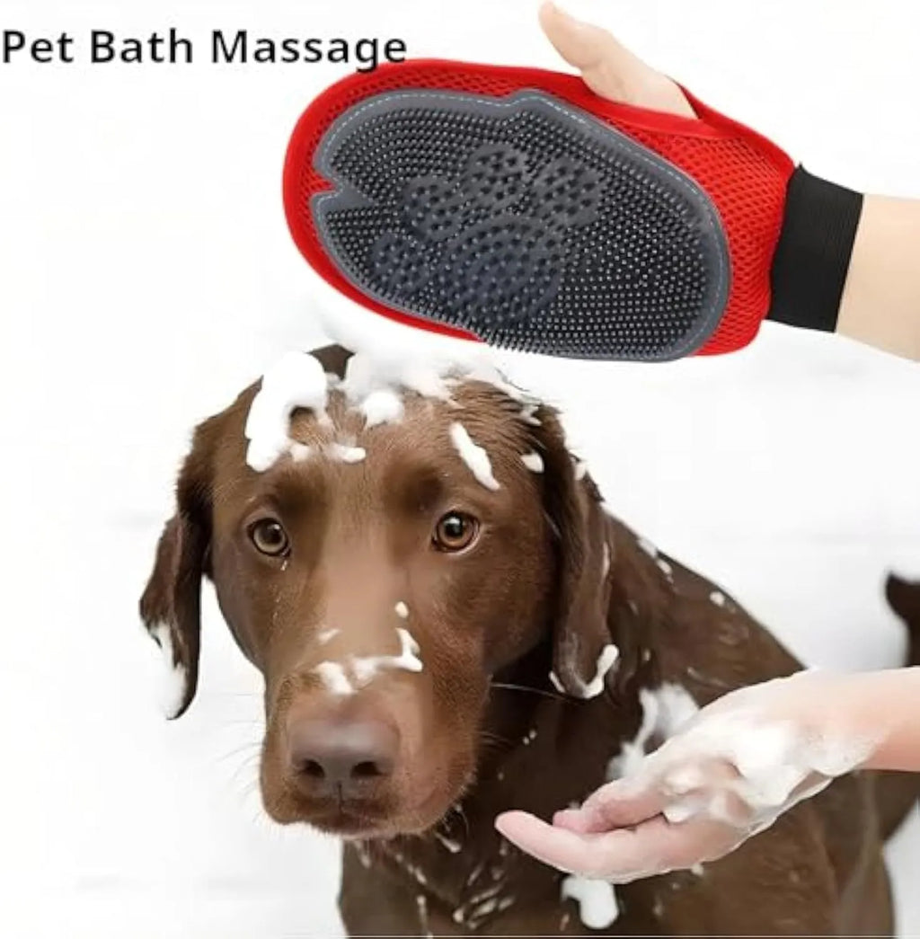 Red pet bathing glove combining a brush and grooming mitt for washing dogs or cats.