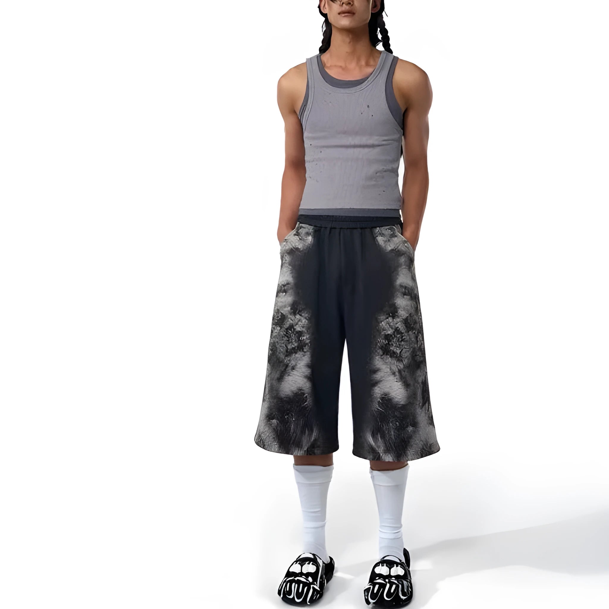 Loose-fit printed polyester streetwear co-ord set showing trousers, seven-inch shorts, and a hoodie on a hanger.