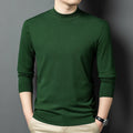 Man wearing a round neck grey wool and mulberry silk pullover sweater with long sleeves.
