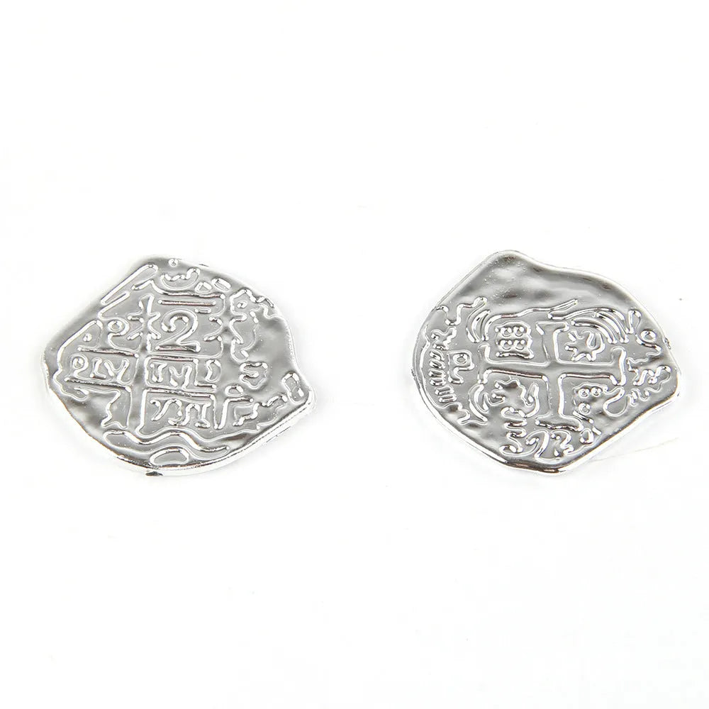 Set of 100 gold, silver, and bronze plastic Roman coins with electroplated metallic finishes.