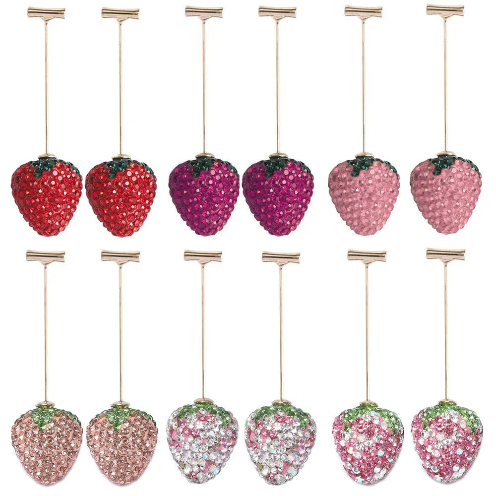 Red strawberry charm stud earrings with spot drill finish on zinc alloy.
