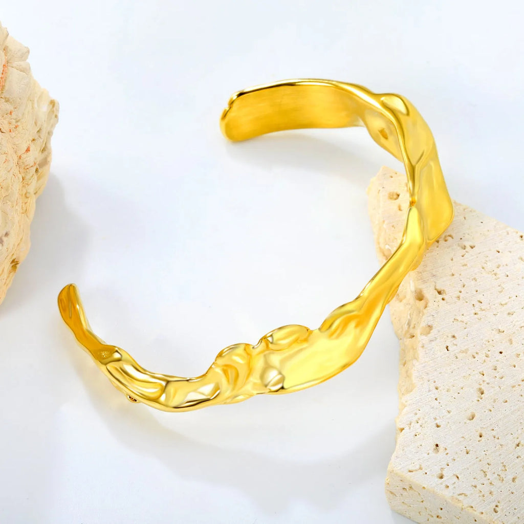 Stainless steel alloy bracelet in gold or silver tone for European American trend styling.