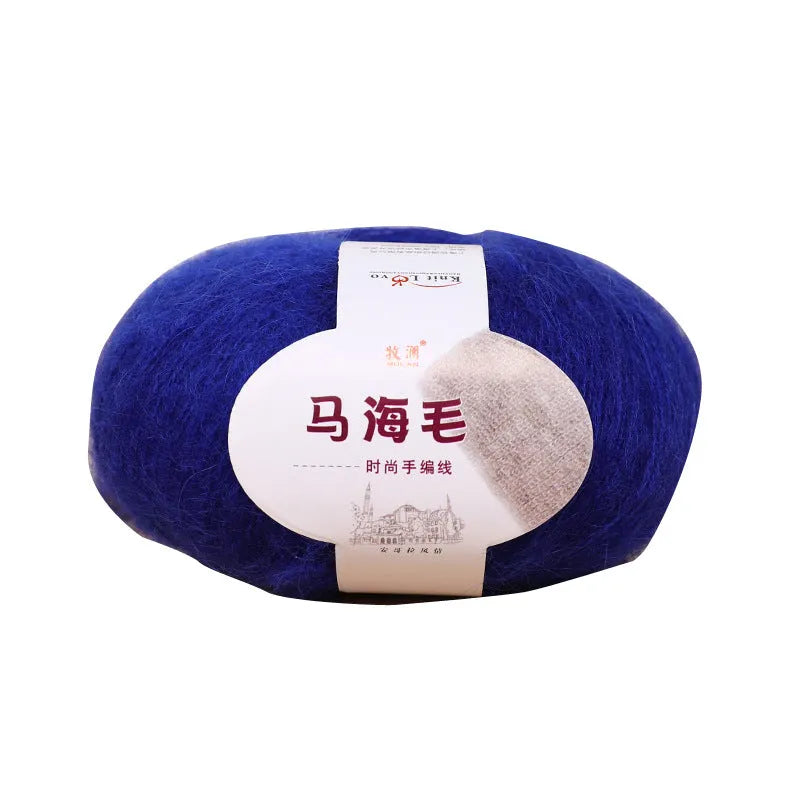 DIY mohair scarf knitting kit showing a ball of wool with 34 colour options including white, grey, pink, and blue.