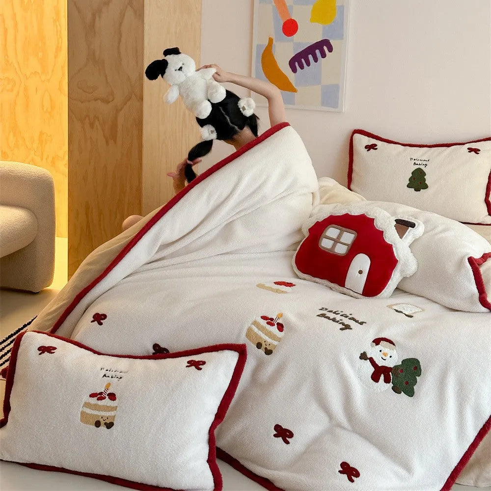 Winter Christmas cartoon cashmere bedding four-piece set shown on bed with duvet cover and pillowcases