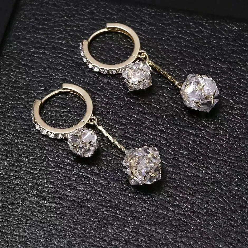 Silver tassel ball earrings with rhinestone drops and confession balloon motifs on copper base