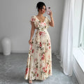 Apricot coloured V-neck dress with digital floral print, ruffled sleeves, and an oversized swing skirt.