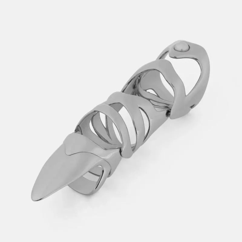 Silver-coloured alloy punk armour finger stall ring on a hand.