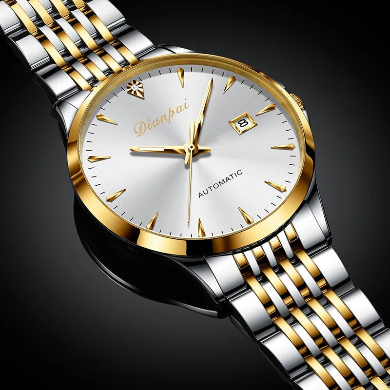 Men's stainless steel automatic mechanical watch with simple white dial on wrist.