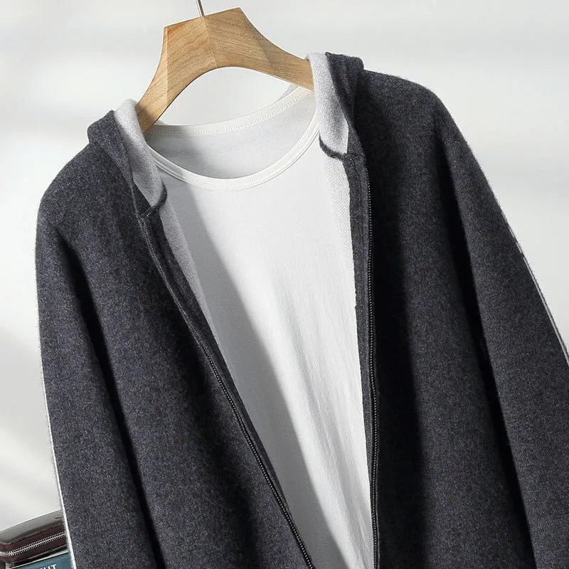 Dark blue men's loose-fit cashmere zip cardigan with a half-high collar, shown on a model.