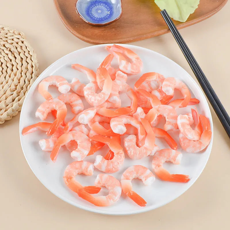 PVC simulation shrimp-shaped novelty keychain with door buckle, shown in modern simplicity style.