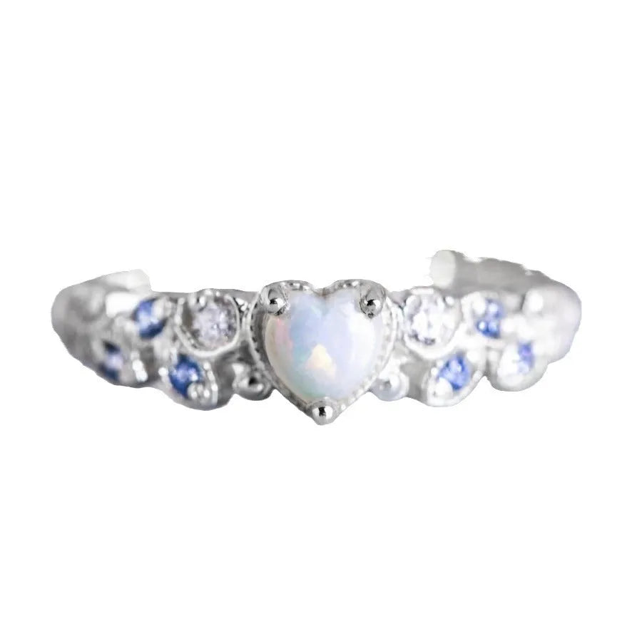 White alloy women's ring with a heart shape and floral opal ocean design details.