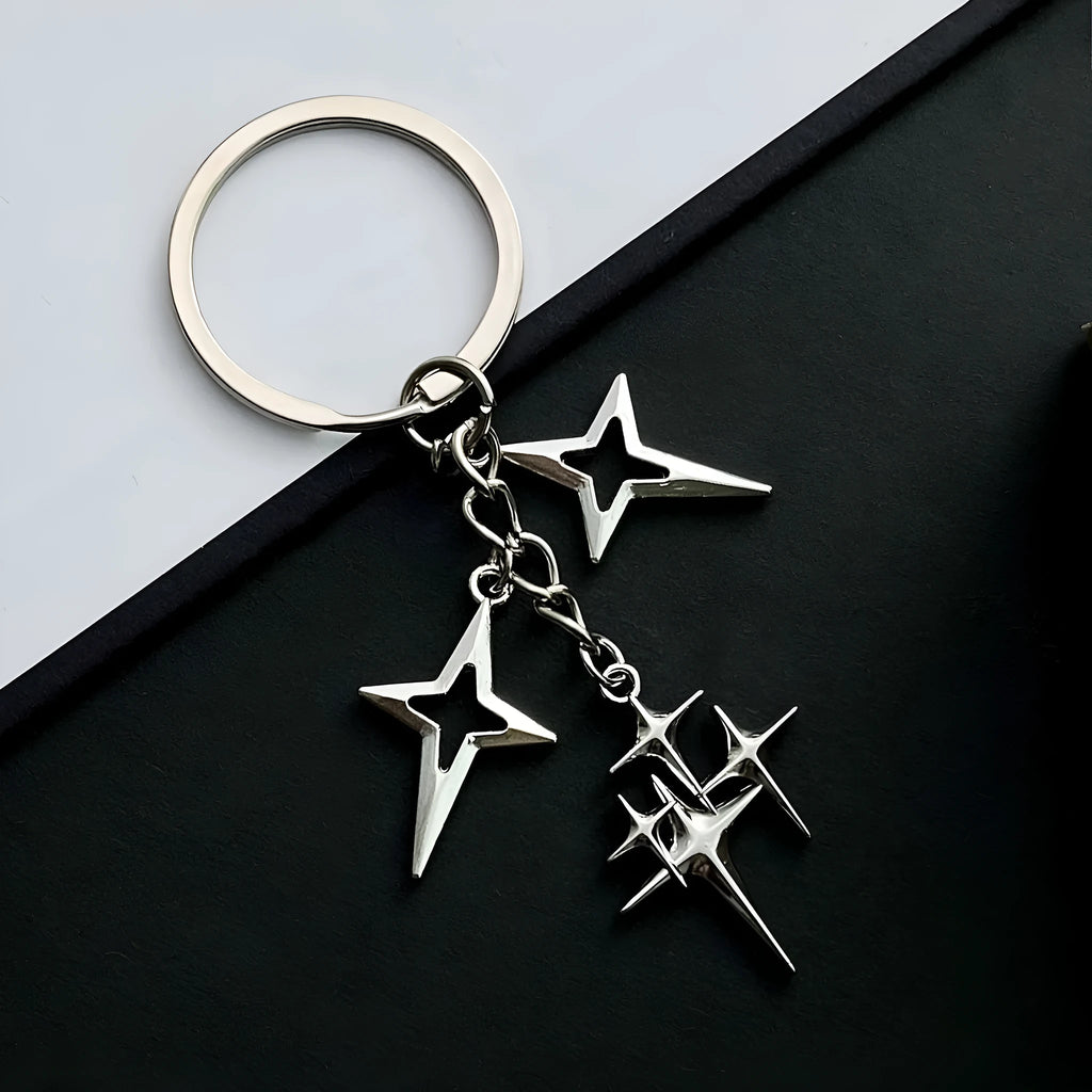 Retro metal alloy keychain with four eight-pointed stars in Q53 colour