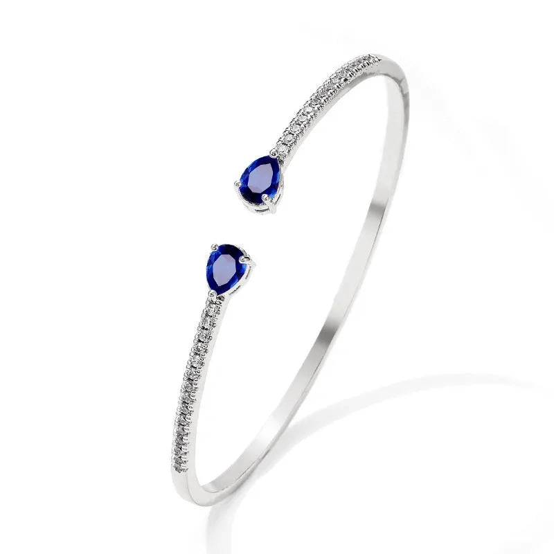 Copper multi-zircon bracelet with simple style in white colour option showing inlaid zircon treatment