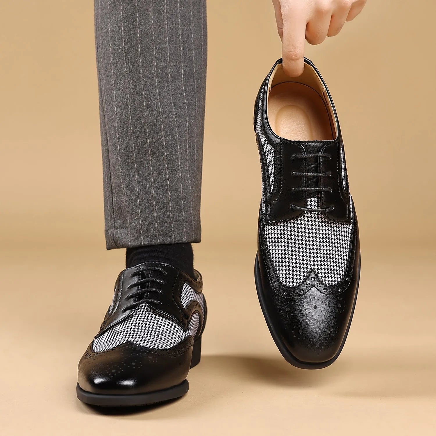 Men's black imitation houndstooth pattern casual shoes with lace-up front and rubber sole.