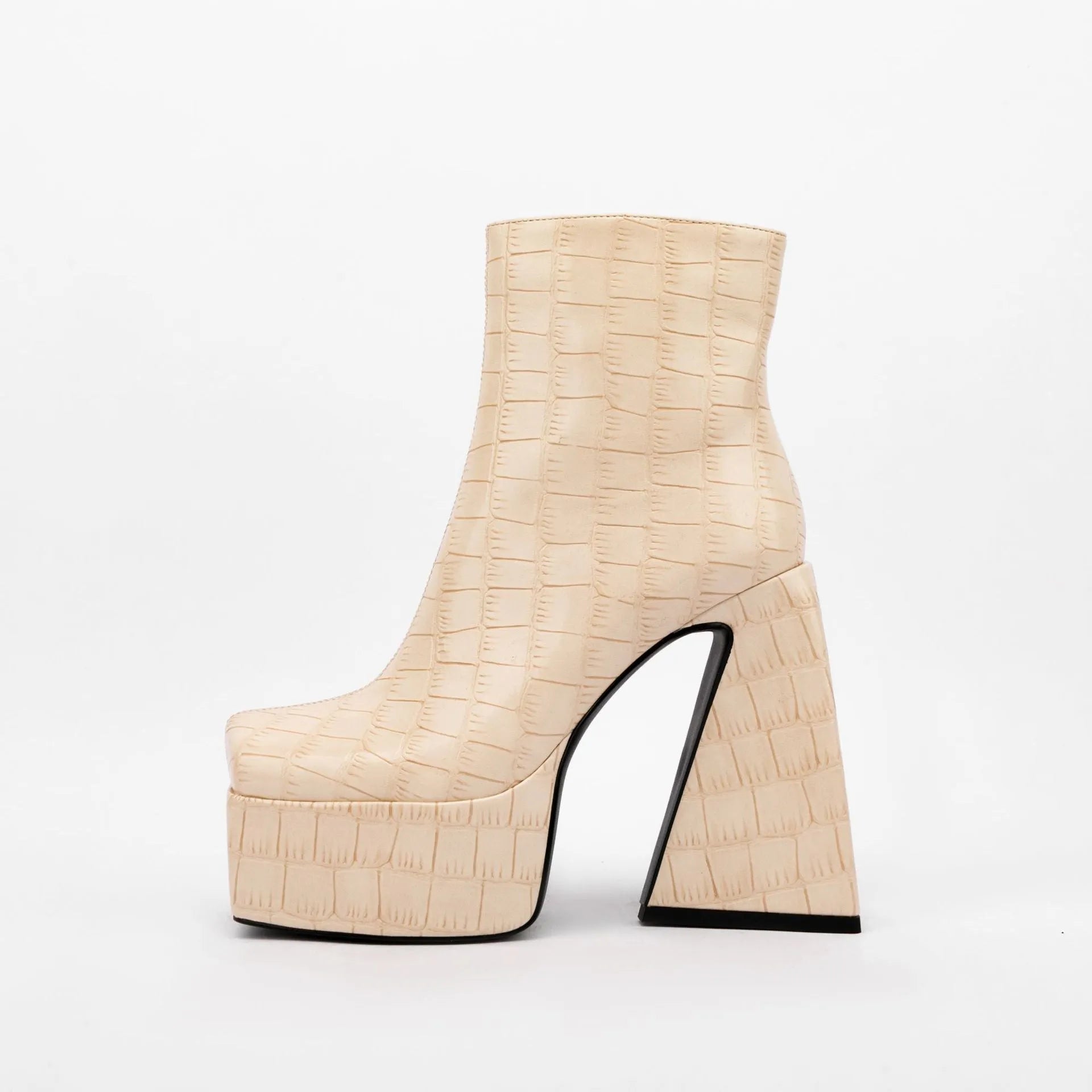 Women's ankle boots with a high heel in artificial PU leather, shown in beige colour.