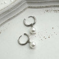 Women's geometric alloy drop earrings with round pearl centre and titanium steel posts in hip hop style