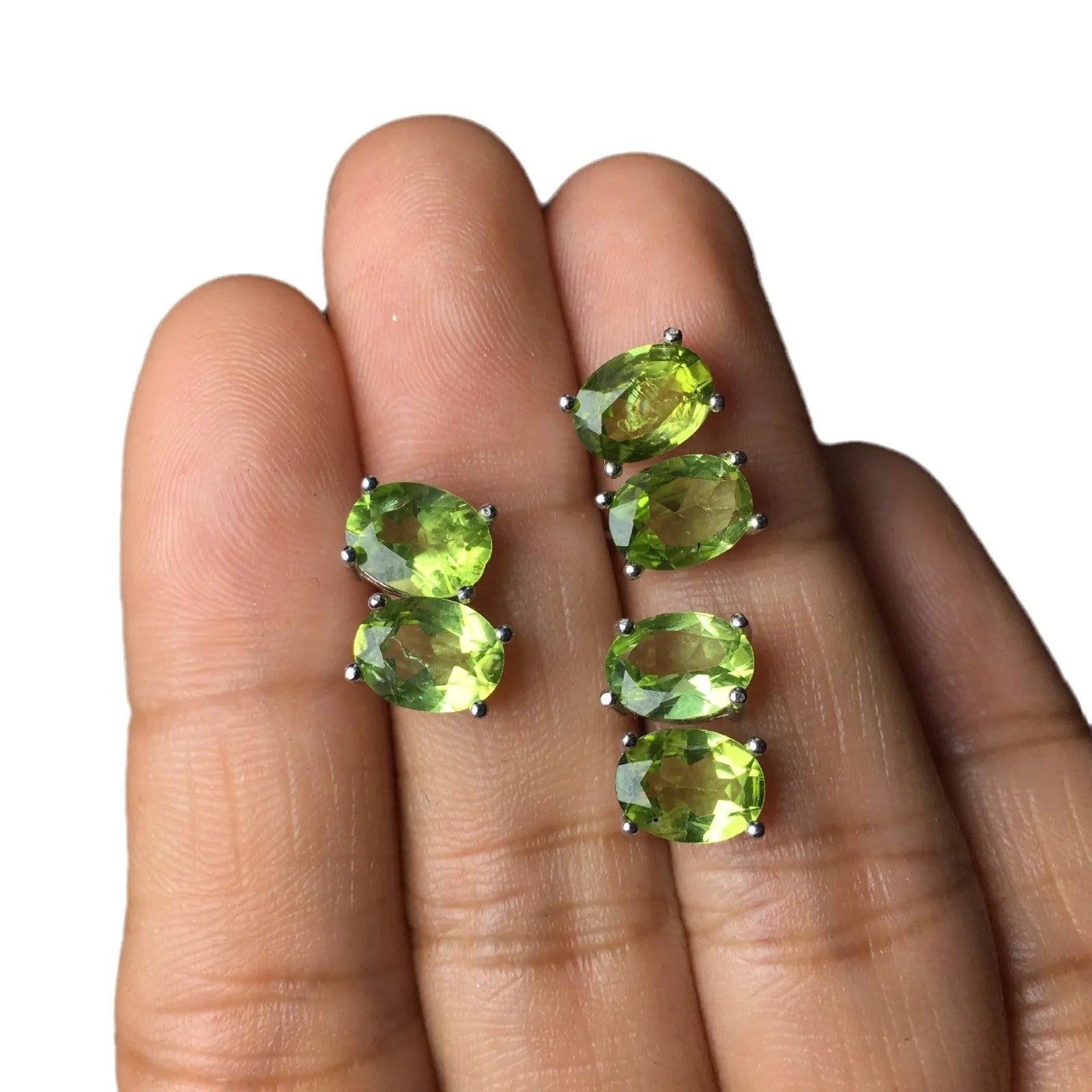 Natural grass green olivine stud earrings in S925 silver with 6x8mm geometric oval stones.