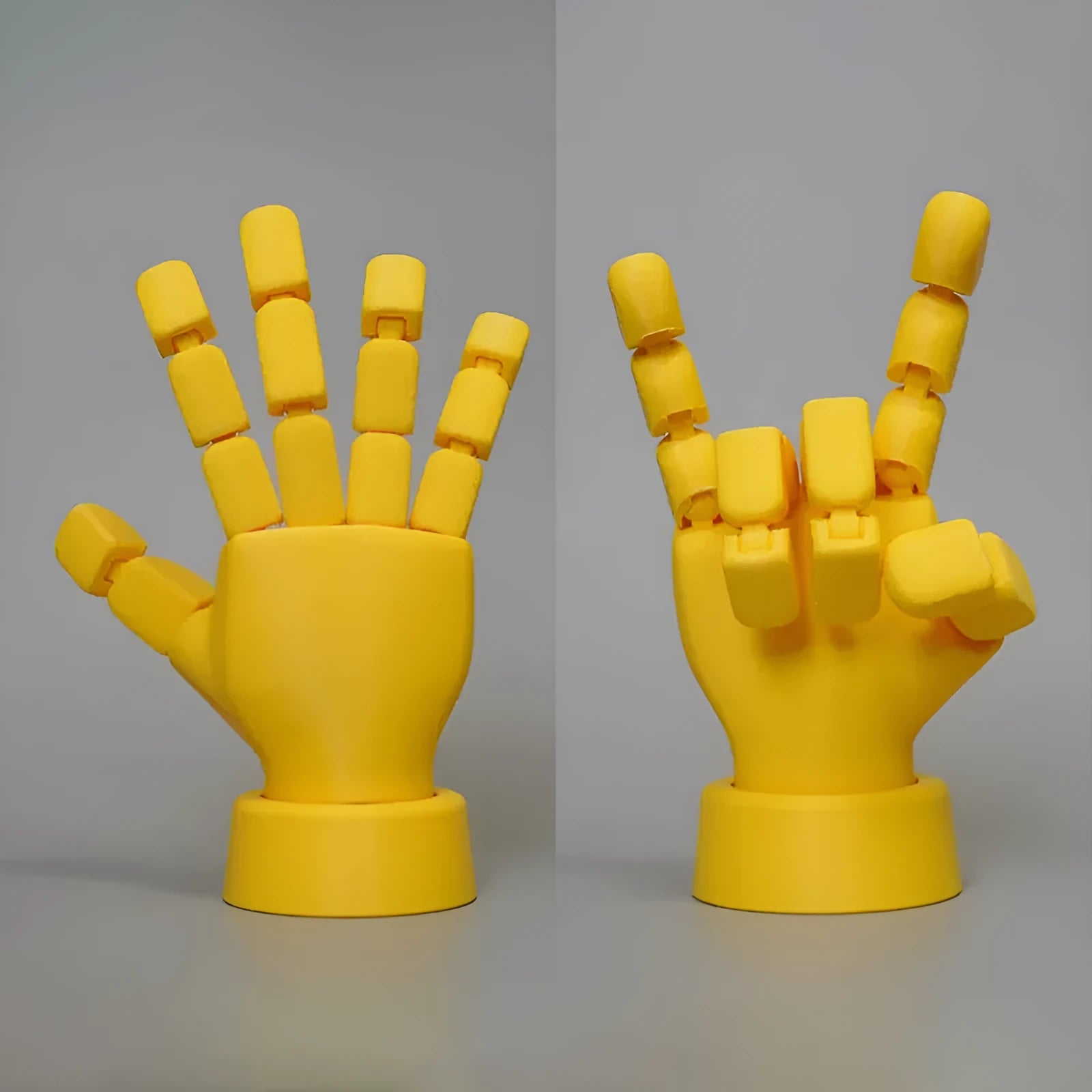 Yellow American-style hand prop figurine with movable joints on a white background