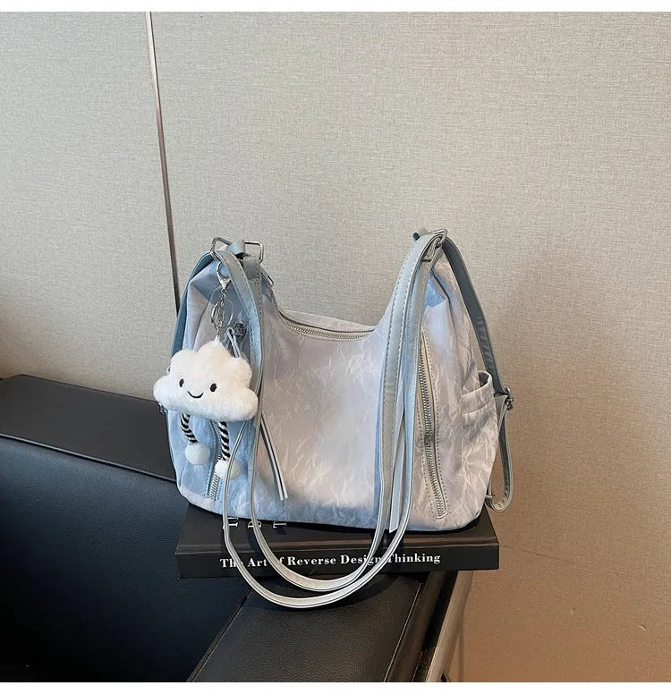 Women's soft PU fashion backpack with pendant accessory in multiple colour options