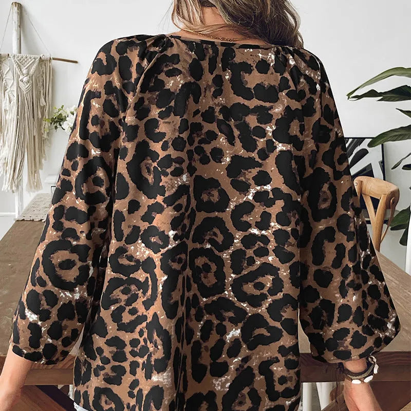 Women's leopard print V-neck pullover top with half sleeves in polyester fabric