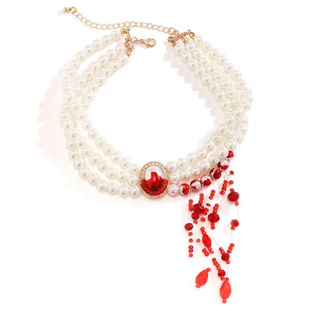 Halloween jewellery set with pearl collar necklace, bracelet, and stud earrings in electroplated gold finishes