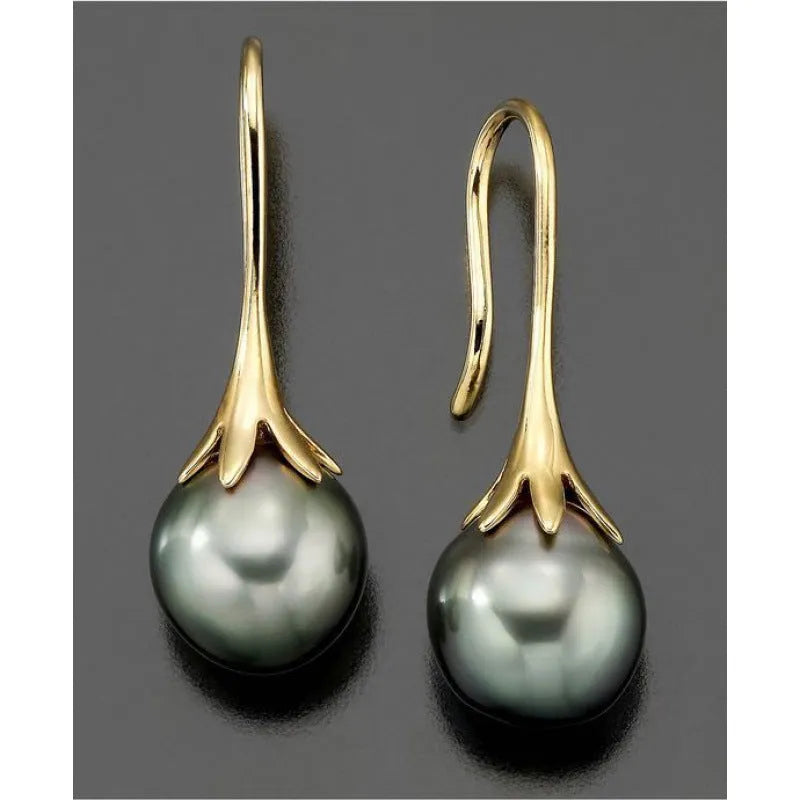 A pair of gold-coloured retro fashion alloy earrings for women with an electroplated finish.