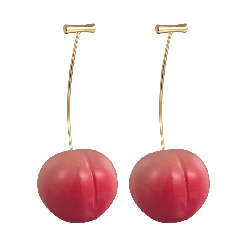 A pair of coloured acrylic peach fruit earrings on copper posts, shown in small and large size options.