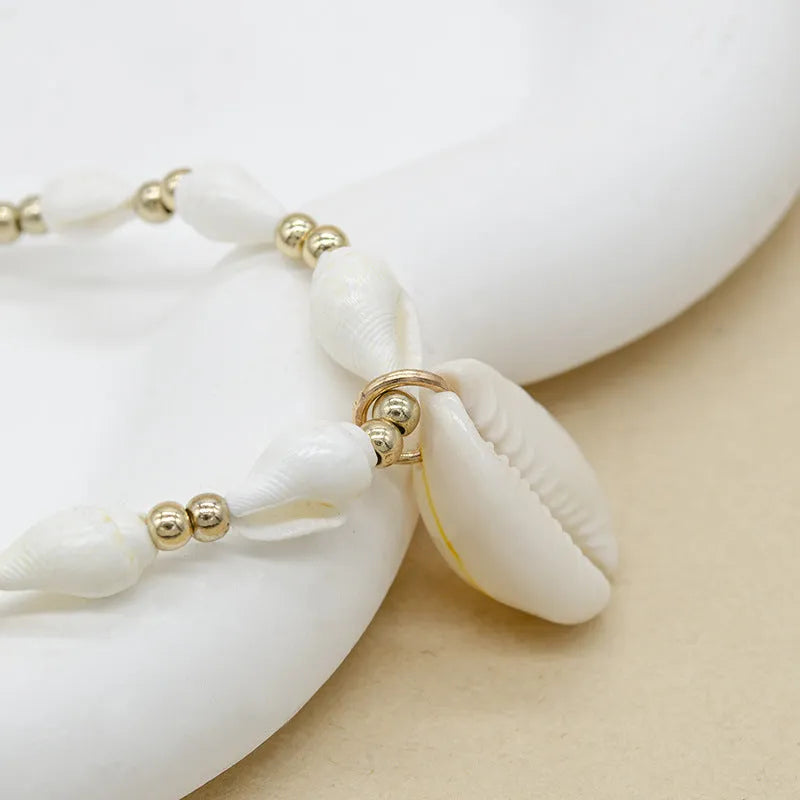 Conch white bead shell necklace with mother-of-pearl pendant on regular chain