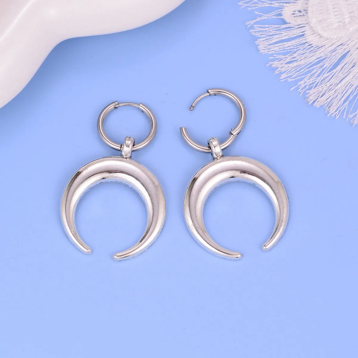 Silver geometric big hoop earrings with moon motif and punk gothic style