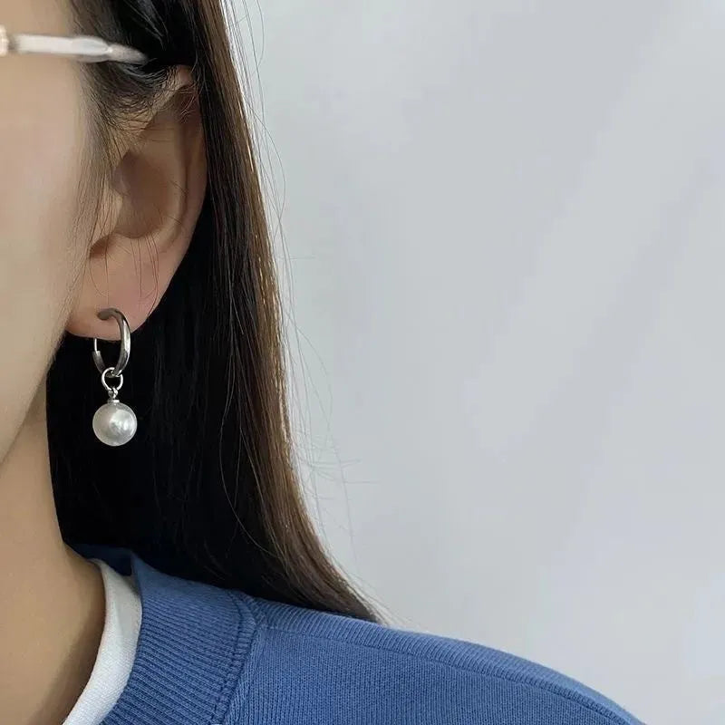 Women's geometric alloy drop earrings with round pearl centre and titanium steel posts in hip hop style