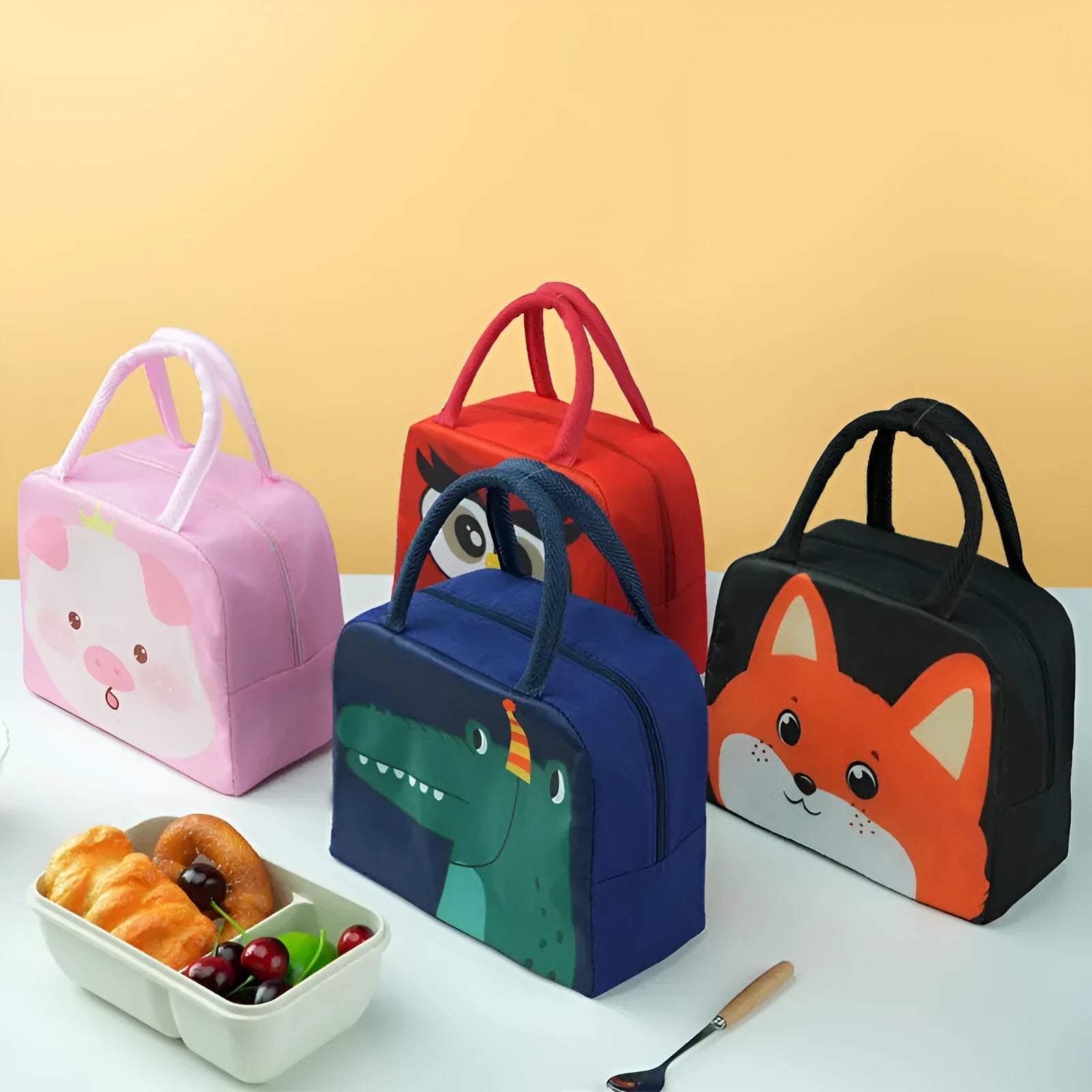 Children's insulated lunch bag in orange bear cartoon design with aluminium foil.