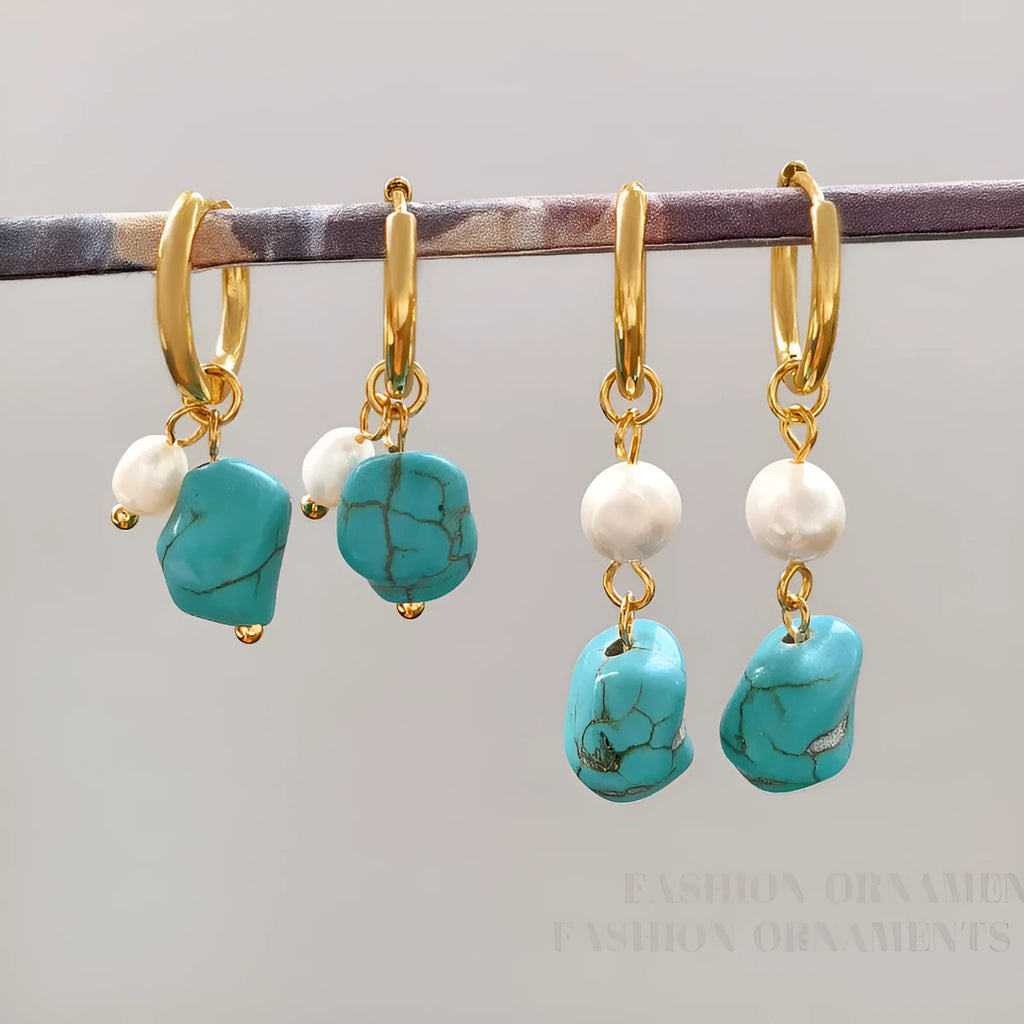 A pair of geometric copper ear clips with irregular turquoise stone and cultured pearls, showing both short and dangle styles.