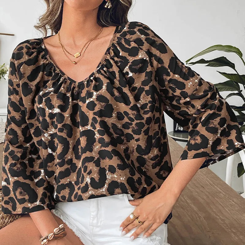 Women's leopard print V-neck pullover top with half sleeves in polyester fabric